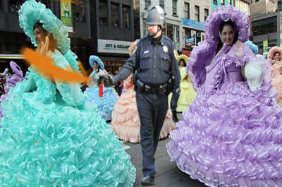 pepper spraying cop at thanksgiving parade in new york 2011.jpg