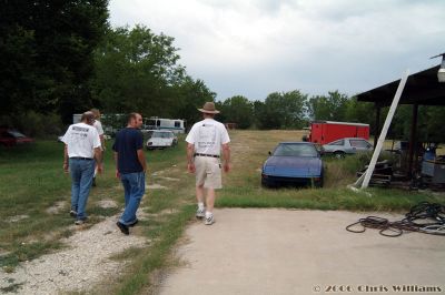 Walking between the shops toward the back of the property