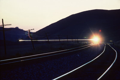 Eastbound Santa Fe at dusk, Christie, Calif.