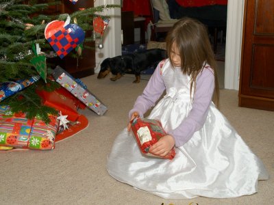 Nicole unwraping present