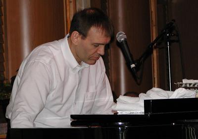 An accomplished pianist, Bert demonstrates his skills on the ivories.
