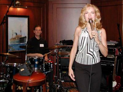 Denise sings as Shayne handles the rhythm section.
