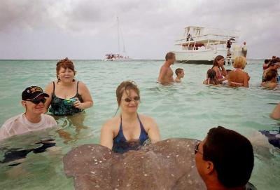 Cheryl plays with the ray as Bill and Sherry look on.