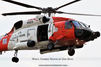 2011 - Coast Guard MH-60J #CG-6023 on a port and harbor patrol just south of downtown Tampa aviation stock photo