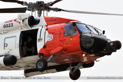 2011 - Coast Guard MH-60J #CG-6023 on a port and harbor patrol just south of downtown Tampa aviation stock photo