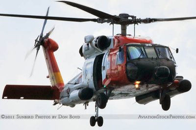 2011 - Coast Guard MH-60J #CG-6036 on a port and harbor patrol just south of downtown Tampa aviation stock photo