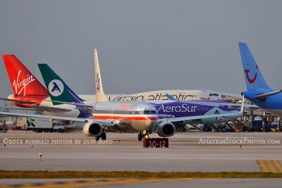 2012 - a variety of airline aircraft at Miami International Airport aviation stock photo