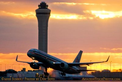 2010 - American Airlines B757 takeoff at Miami International Airport aviation sunset stock photo