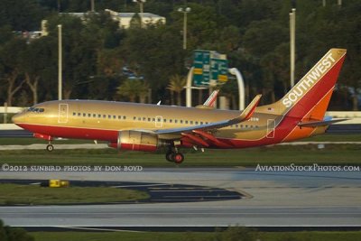 2012 - Southwest Airlines B737-7H4 N792SW in the Retro Gold scheme on approach to 1L at TPA airline aviation stock photo