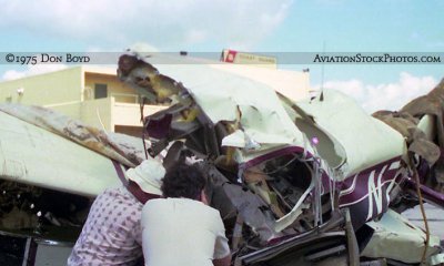 1975 - wreckage of C-172K N7250G inspected after crashing and killing all four onboard