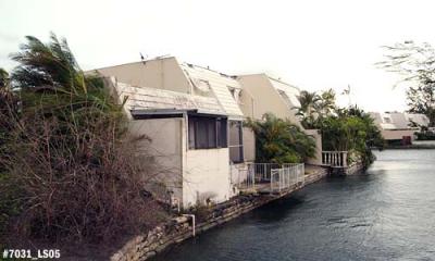 Hurricane Wilma roof tile damage at the top of the second Lake Mary townhouse photo #7031