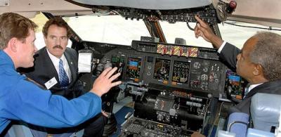 Attendees in the cockpit at the roll-out ceremony for the modernized C-5M