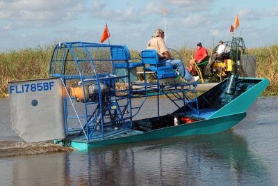 Bud Marquis, The Angel of the Everglades and his famous airboat leading the procession out to the crash site, photo #2882