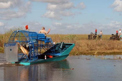 Bud Marquis, The Angel of the Everglades and his famous airboat leading the procession out to the crash site, photo #2883
