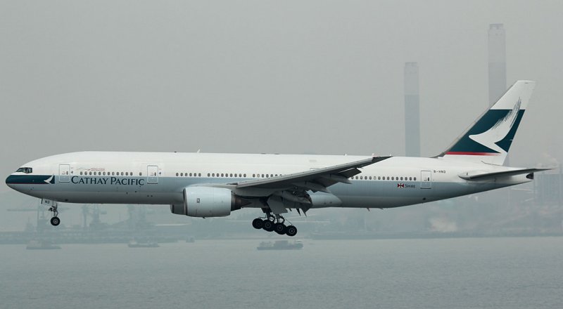 Cathay B-777-200 arriving at its home base.