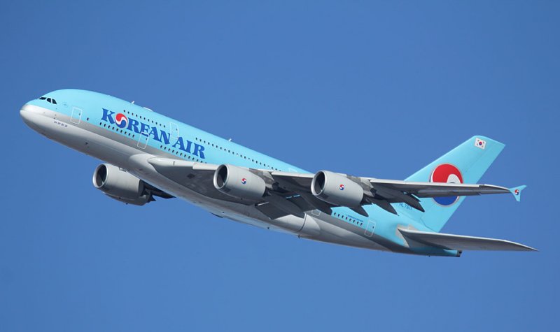 Korean A-380 departing JFK Runway 31L on a clear winter day.