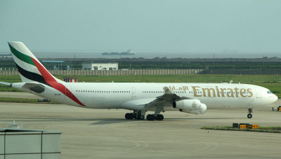 Emirates A-340 leaving its gate, PVG, Sept  2011
