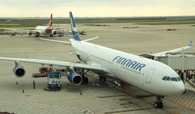 Finair A-340 at its gate in PVG