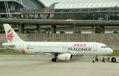 Dragon Air A-320 being pushed back from its gate, PVG, Sep 2011