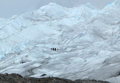 Tourists walking on ice
