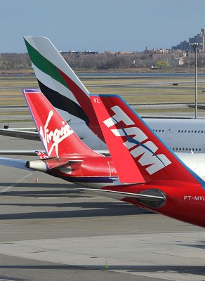 Tails from three continents meet in JFK
