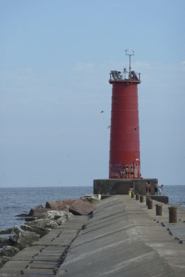 More walking on piers: The homely (and graffiti-defaced) Sheboygan breakwater light.  Kids were jumping off the pier.