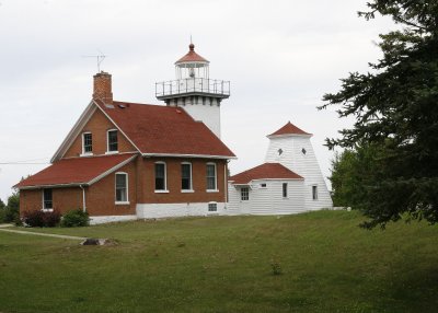 Sherwood Point lighthouse outside Sturgeon Bay.  A baby was crying as I took this picture from the No Entry sign.