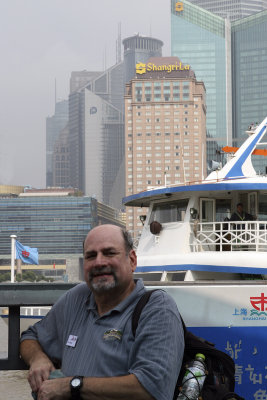 Howard & I skipped the Shanghai Museum visit & took a ferry across the river.  Our hotel (Shangri La) is in the background.