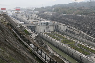 The 3 Gorges Dam was very expensive  & is controversial. Many people were moved to highrises along the river as a result.