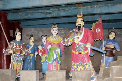 The way up the temple was narrow with wooden steps.  Here's one of the dioramas up top.