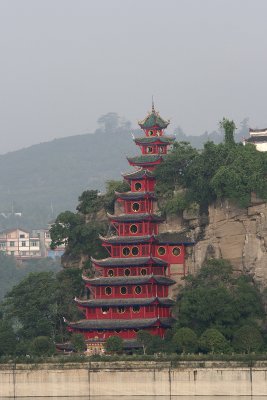 Early in the morning, I walked around the Emerald and got my 1st glimpse of the Shibaozhai pagoda. Note wall around base.