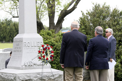 Bob Bradford and Jorge Rovirosa placed a wreath in front of Roller's headstone.