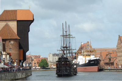 Crane & pirate ship & waterfront work boat