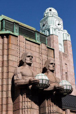 I went back to the ship to get Howard.  We ended up at the train station, which has huge art deco men outside. 