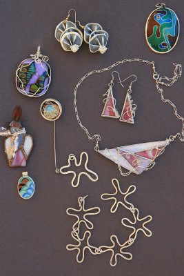 I made jewelry - LOTS of jewelry (formed silver, cloissone enamel, stained glass, paper earrings)