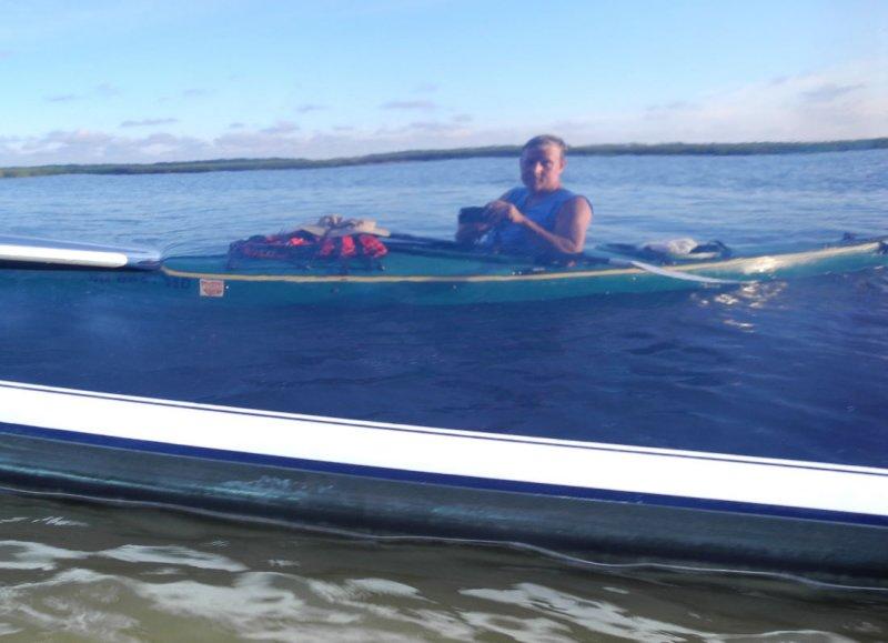 Self-portrait reflection in the shrip boat hull 