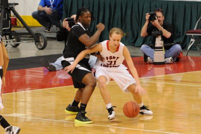 Clair dribbling around Miss Watts