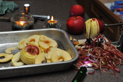 Peeling apples by candle-light during power outage