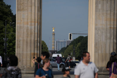 Looking through the Brandenburg Gate to the Victory Monument in the Teirgarten
