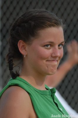 Katie reacts to cheers from the bench