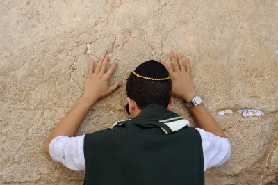 Jewish boy praying at Western Wall
