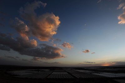Sunset over greenhouses at moshav Hatzeva, Arava desert