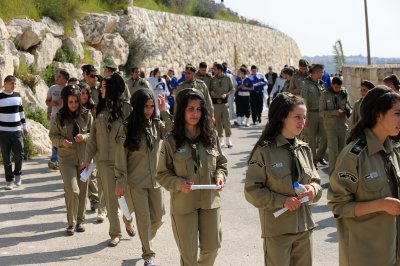 Teenage girls wearing uniform in Palm Sunday procession