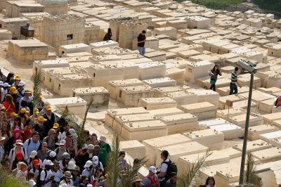 Taking a shortcut via the Jewish cemetry on the Mount of Olives
