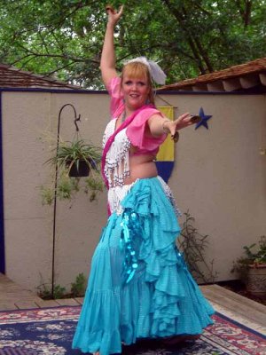 Cheryl shows off her belly dancing skills