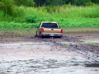 This guy had grand plans with his girl once he drove across the water.  The Truck got stuck, she walked back to camp.  FAIL!!