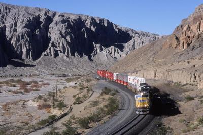 K line stack train eastbound in the morning in Afton Canyon. 3-06