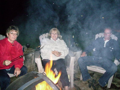 The Girls around campfire