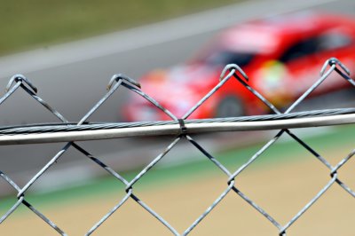 Motor-racing fence