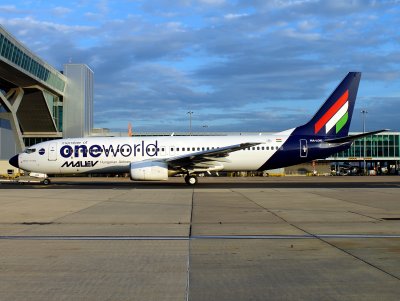 Great to see Malev changed this -800 to One World. LGW at the North terminal facing Southwards. The Aircraft is actually facing East, but the good light from this side won't last for much longer..